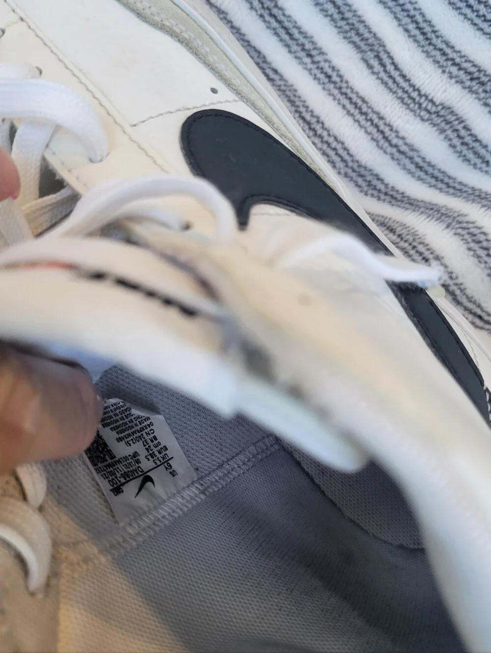 Nike White High-Top Blazers Sneakers with Black Swoosh and Red Tongue Tag